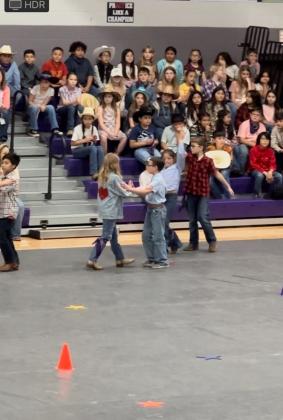 3rd graders Bryce Johnson and Emma Kate Kuehl performing the two step at the 2nd Annual San Saba Showdown. Courtesy of Jessica Fuller