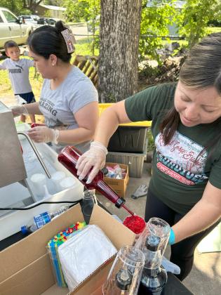 Volunteers were treated to free snowcones on a hot day - Photo courtesy of Corina Fauley
